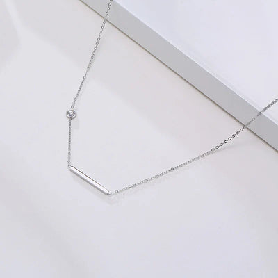 Solenne | Sideways Cross Necklace