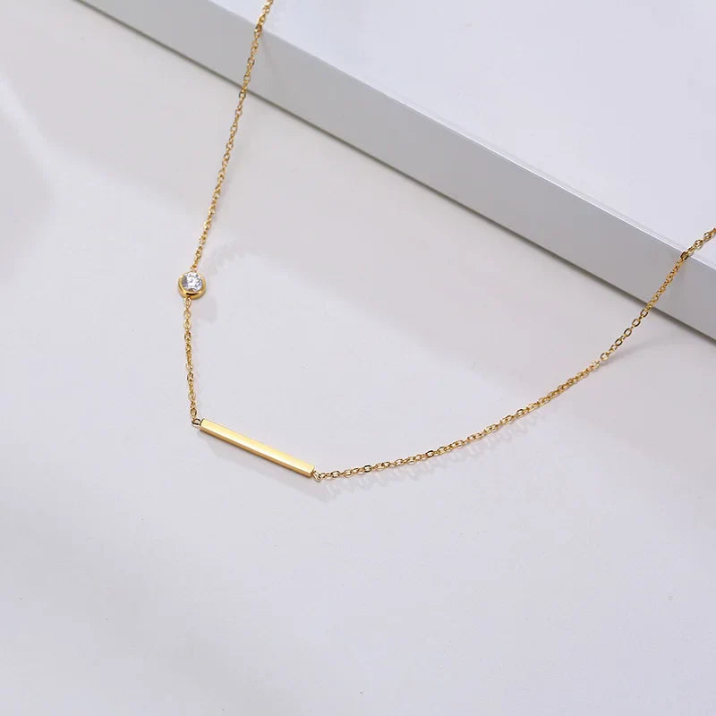 Solenne | Sideways Cross Necklace