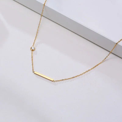 Solenne | Sideways Cross Necklace